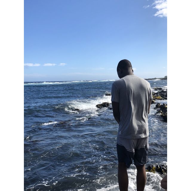 dayo staring into the ocean